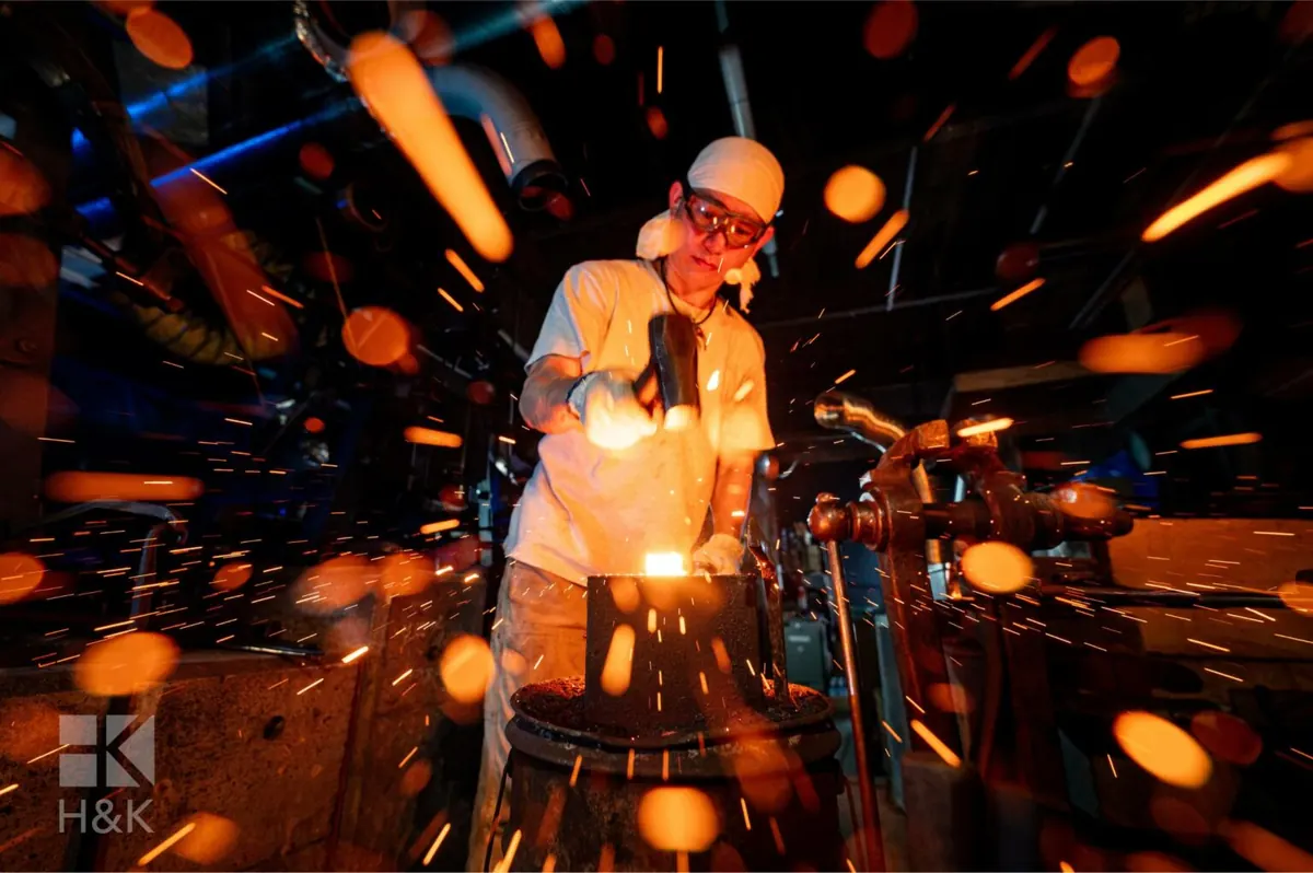 Naoki Mazaki forging a knife blade in his workshop